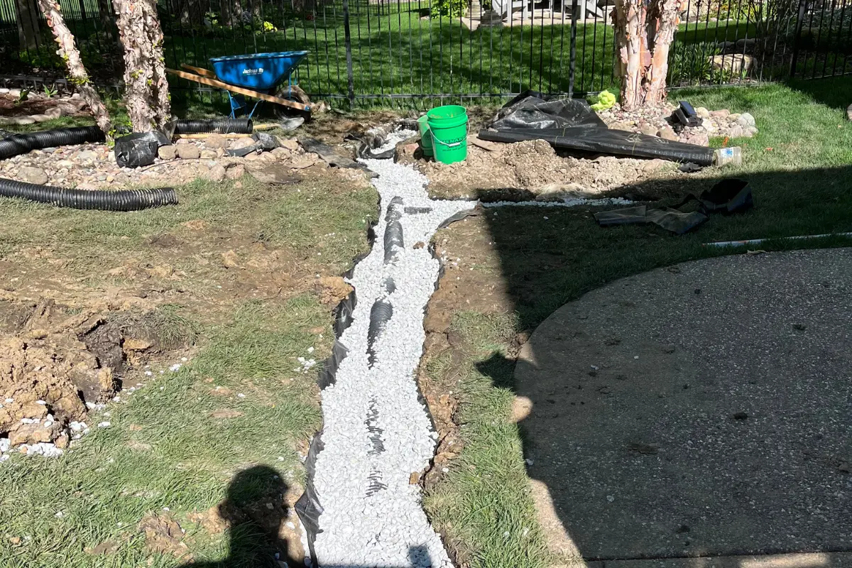 Professional French drain installation in progress