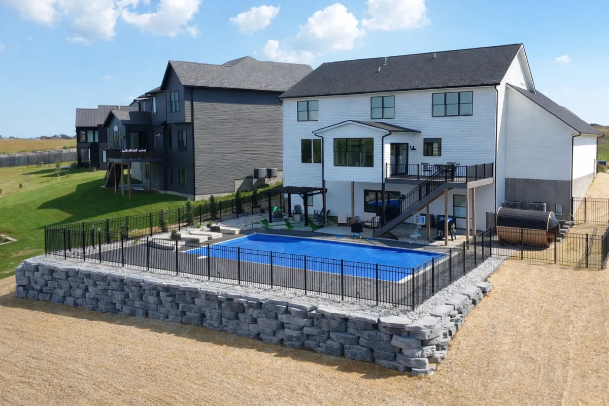 Finished retaining wall and landscaped planting bed